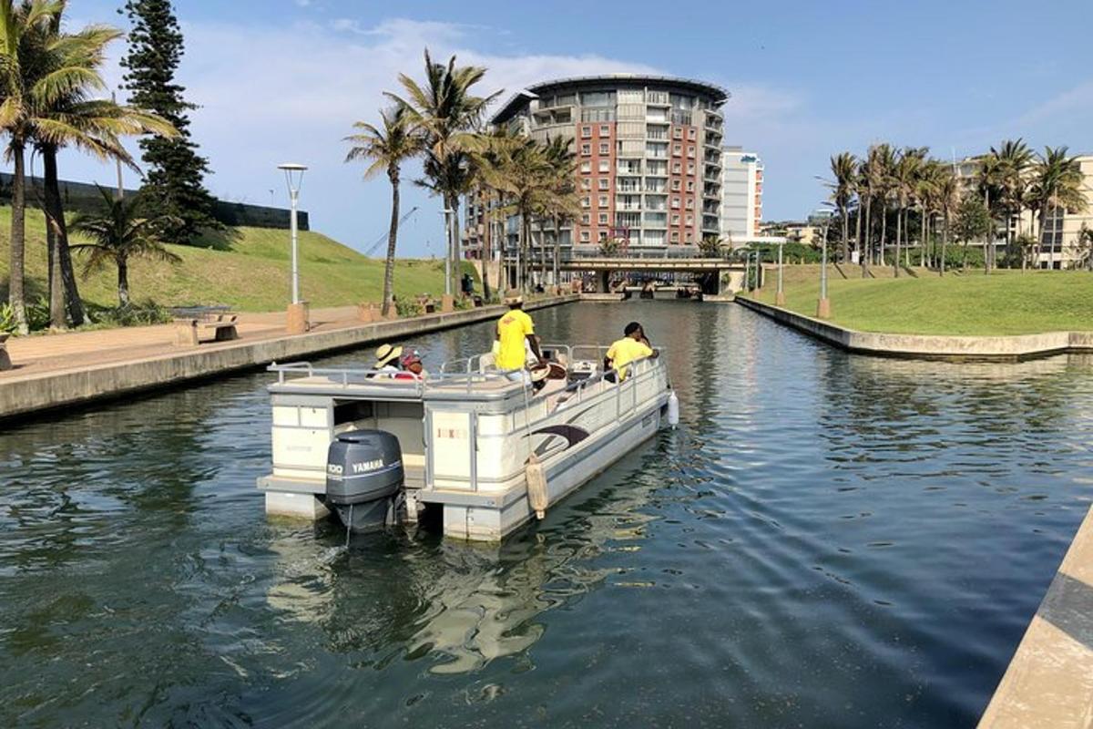 a group of people on a boat in the water