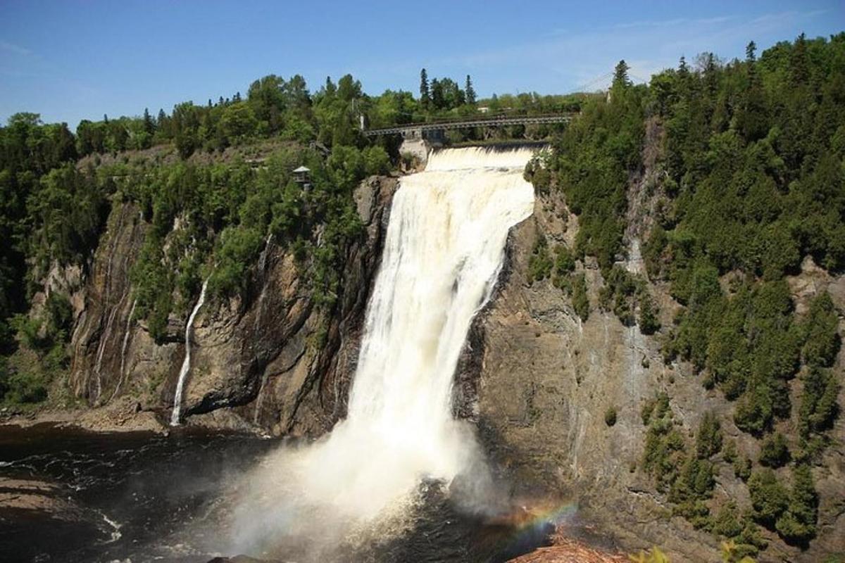 a waterfall on the side of a mountain