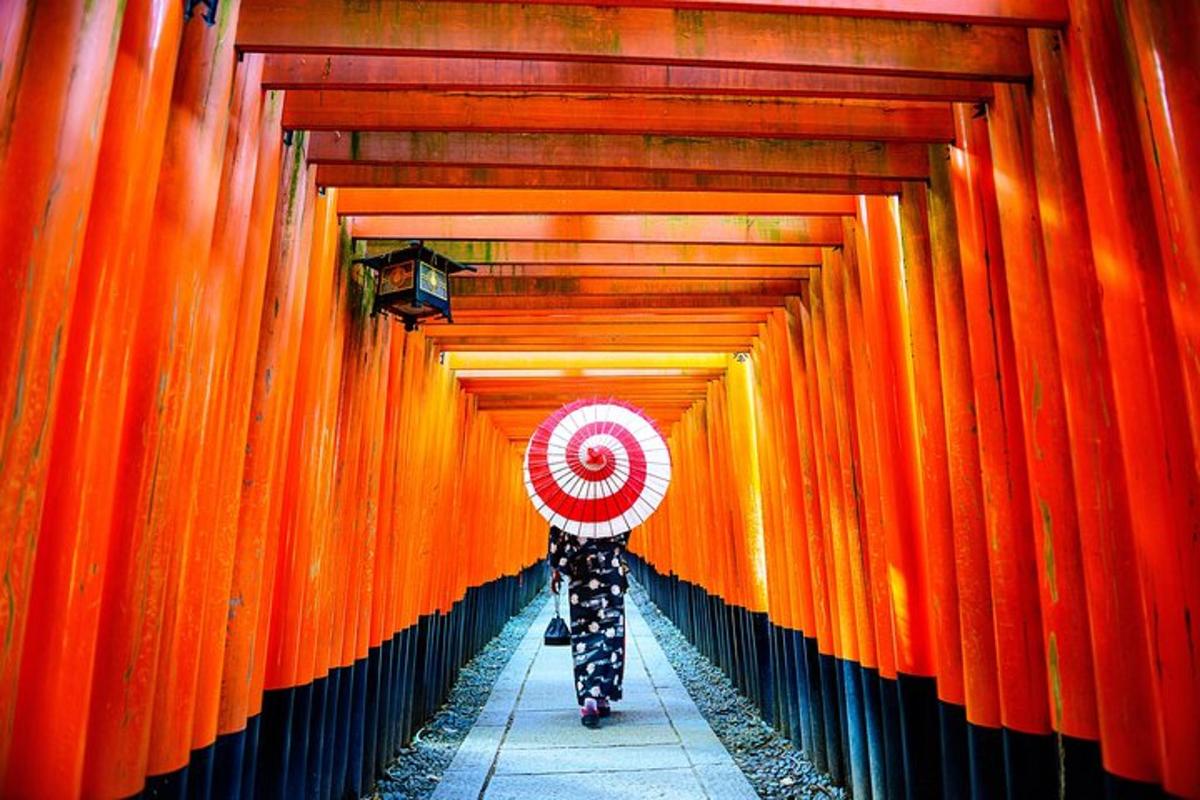 a person walking through an orange tunnel with a target