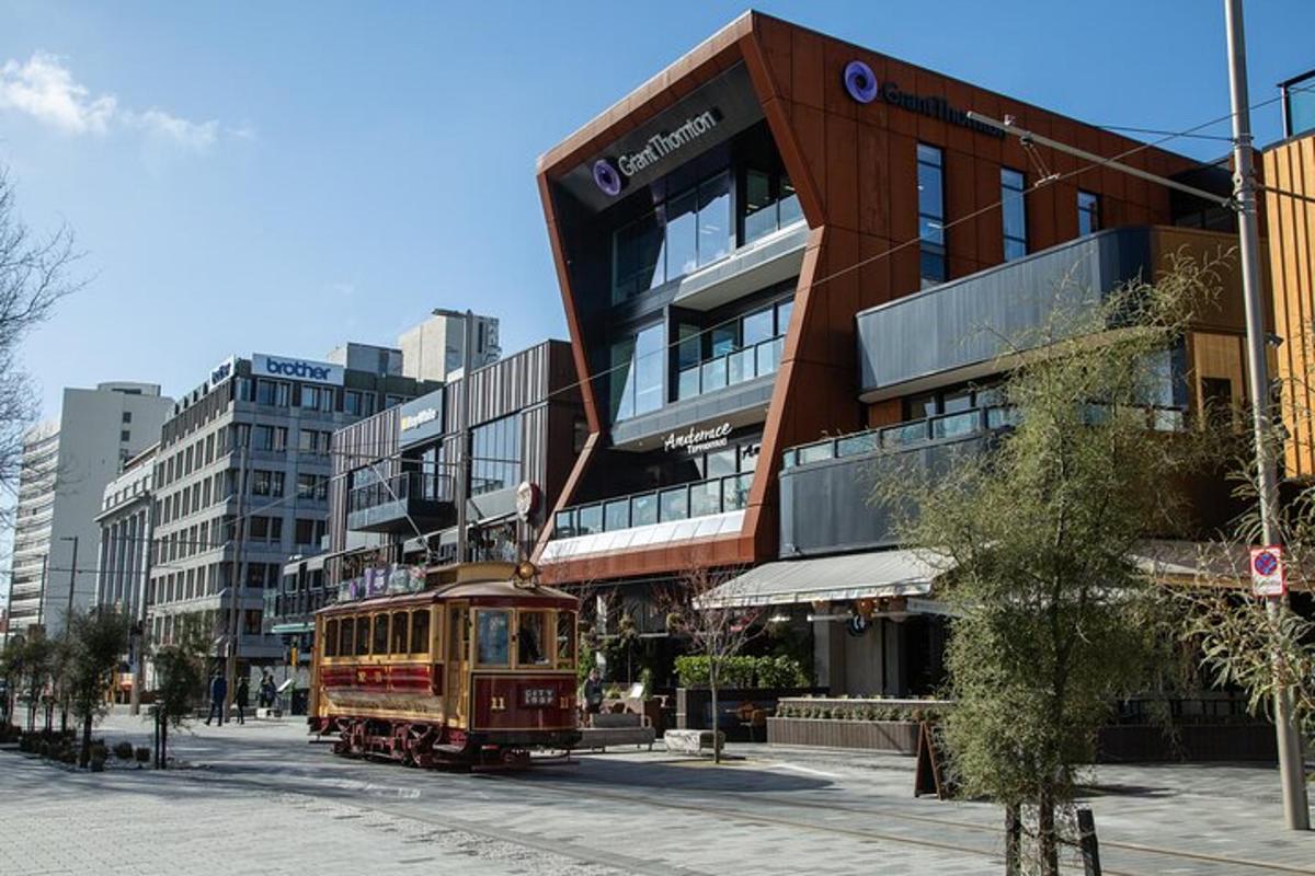 a trolley car in front of a building