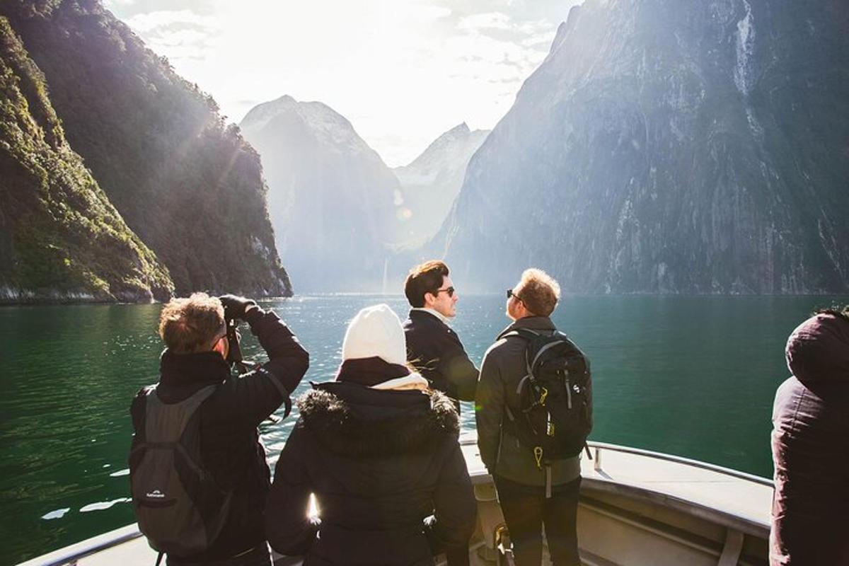 a group of people on a boat in the water