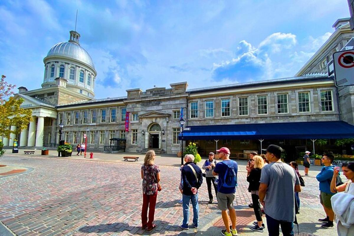 a group of people standing in front of a building