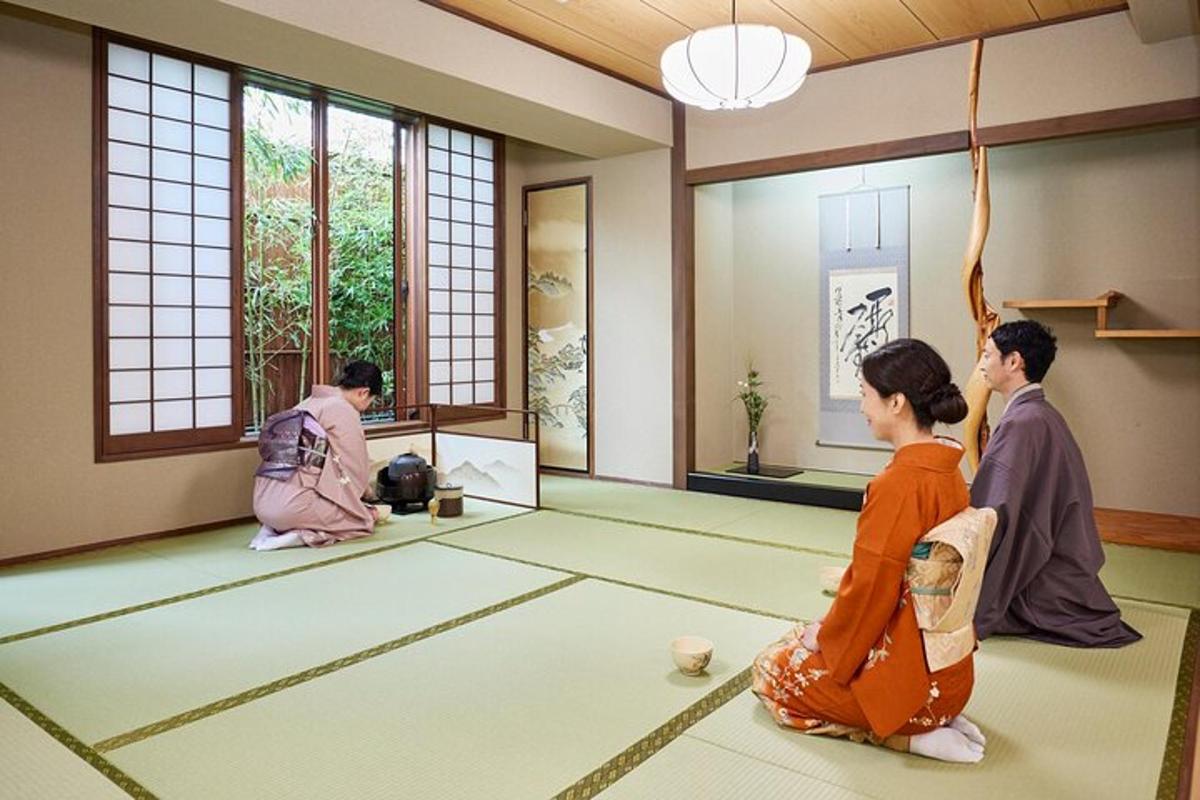 a group of people sitting on the floor in a room