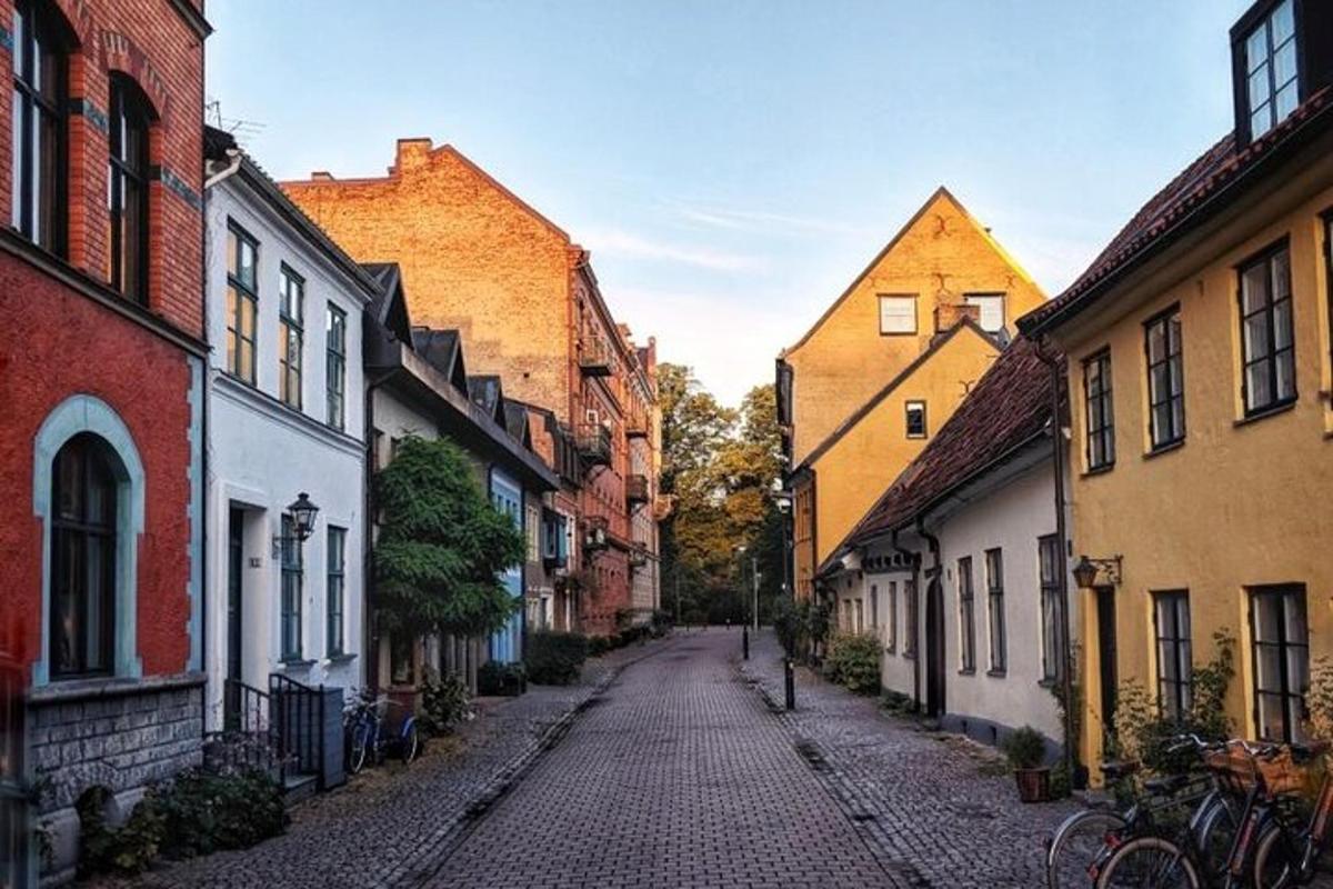 a cobblestone street in an old town with buildings