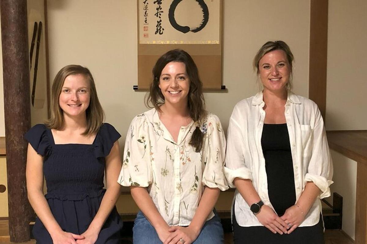 three women are standing next to each other