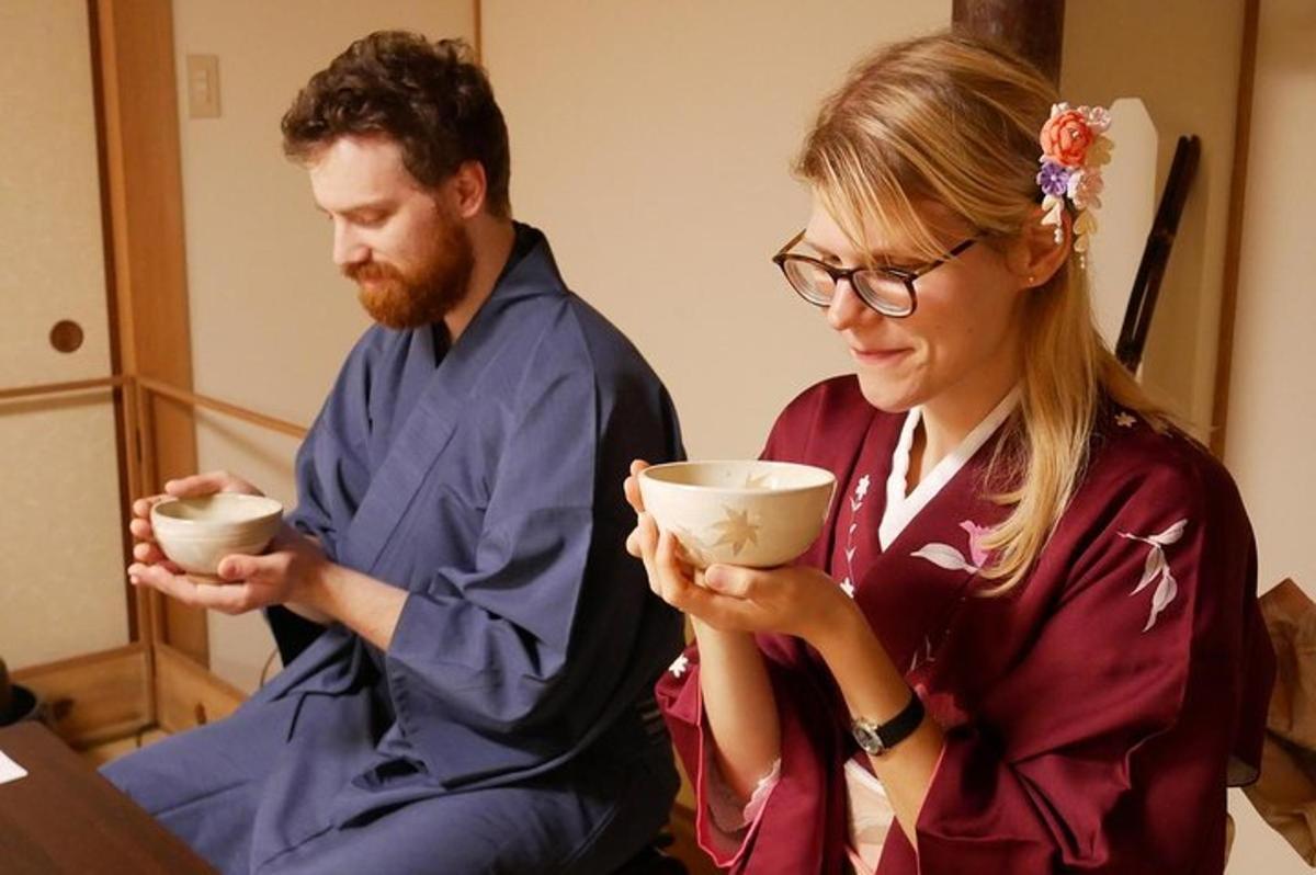 a man and a woman holding bowls in their hands