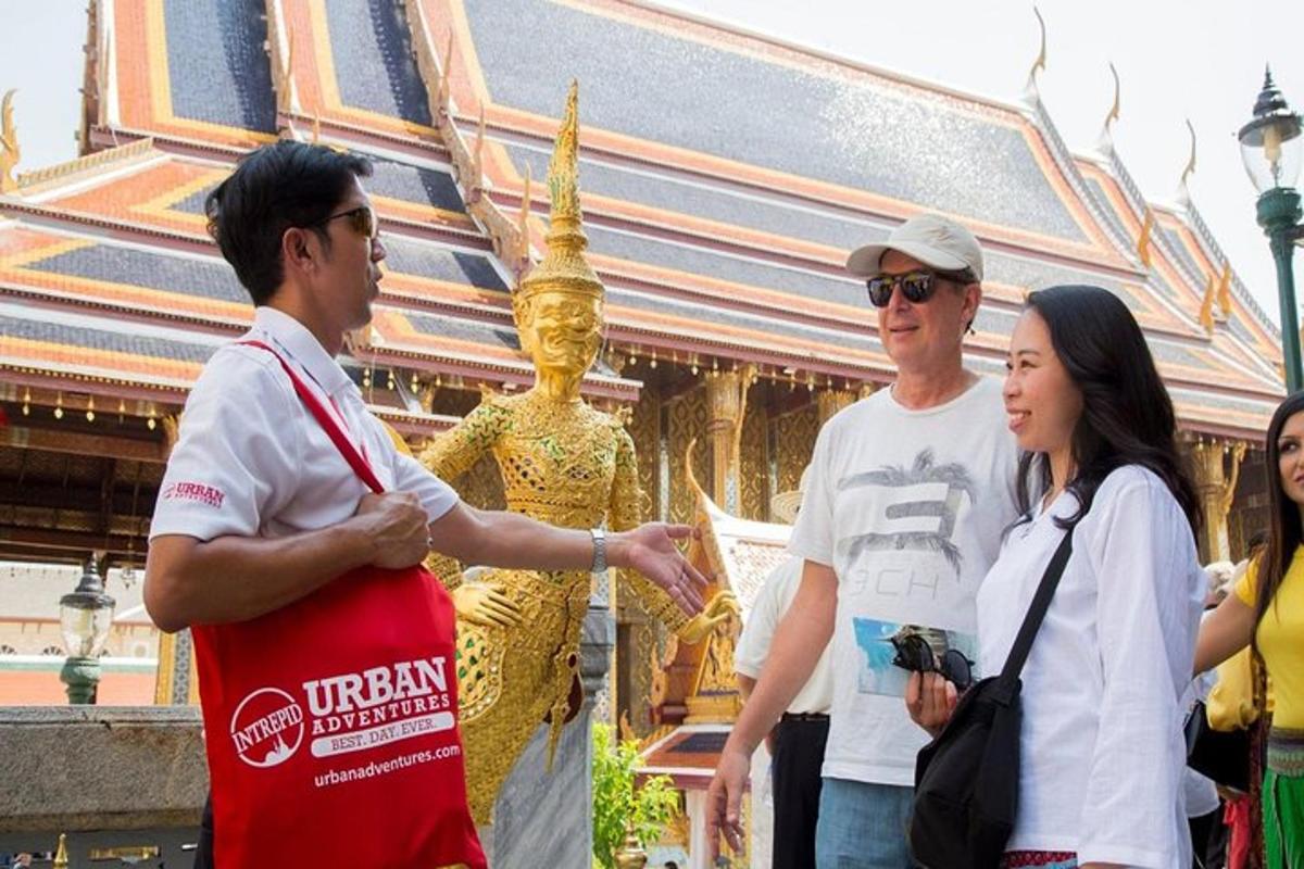 a group of people standing in front of a temple
