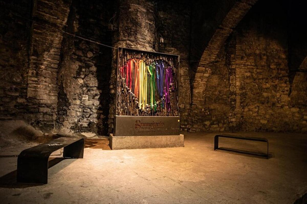a dark room with a stage with a bunch ofbows