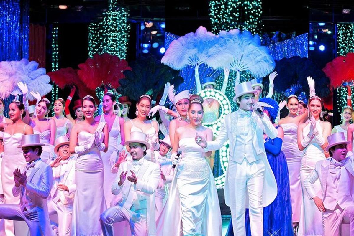 a group of people in costumes on a stage