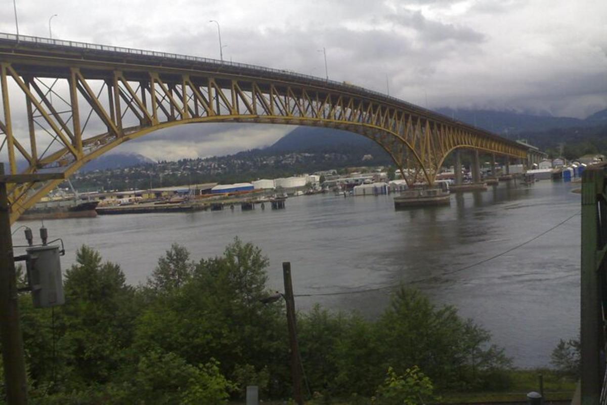 a bridge that is over a river with water