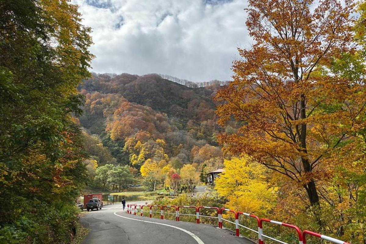 a winding road in the middle of a mountain