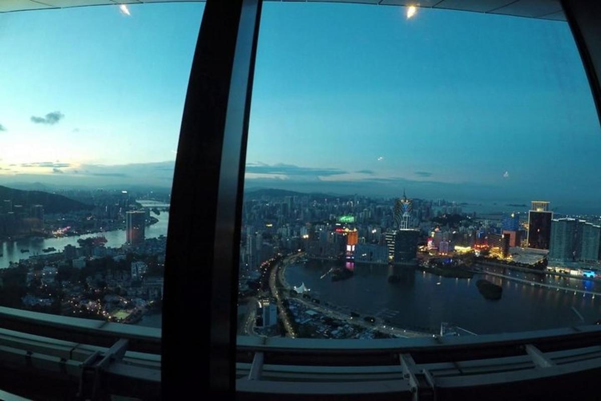 a view of a city at night from an airplane