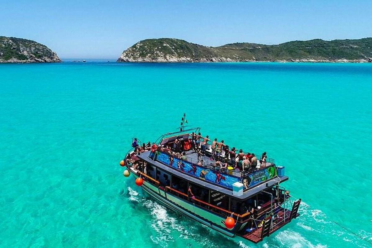a boat with people on it in the water