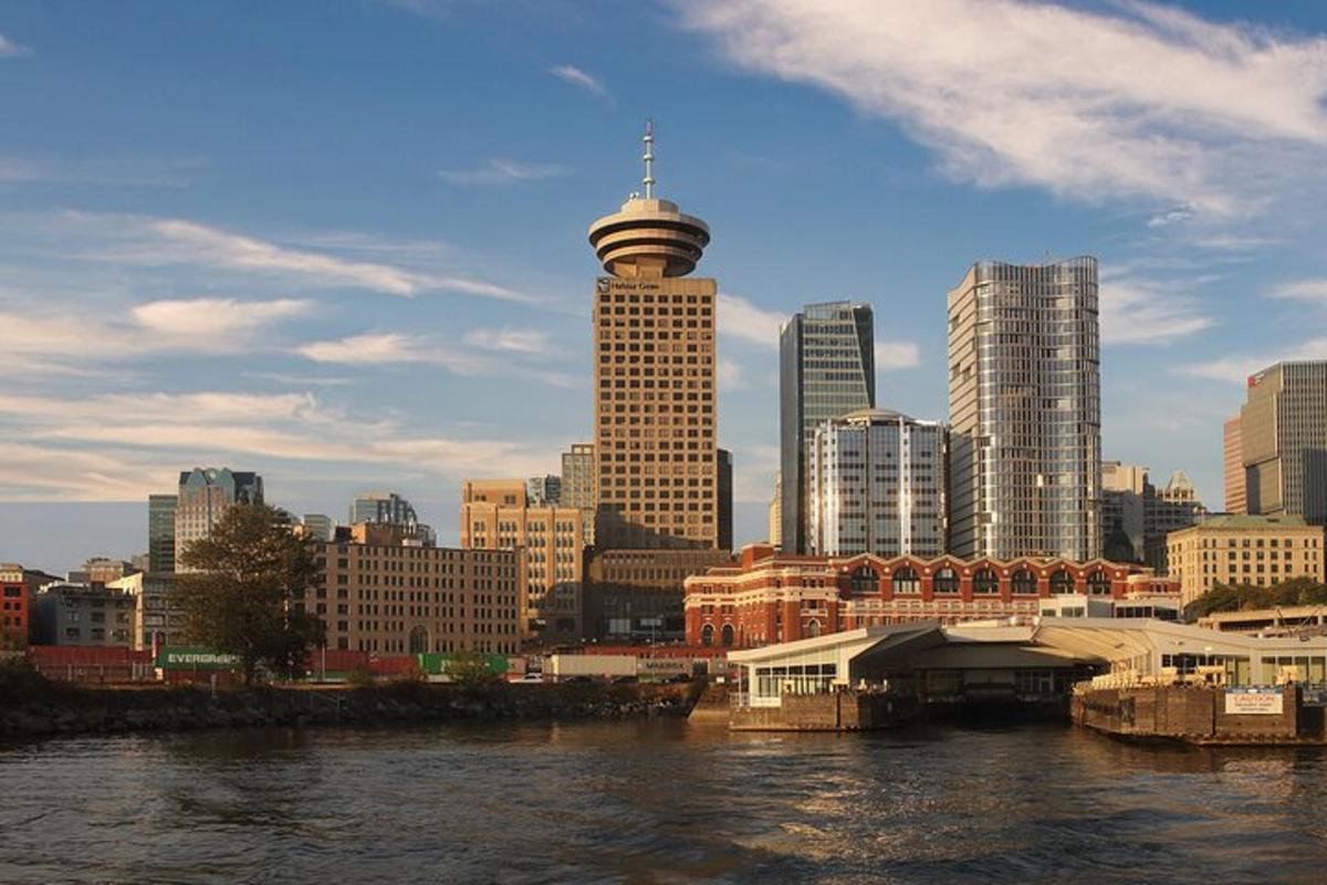 a view of a city with a river and buildings