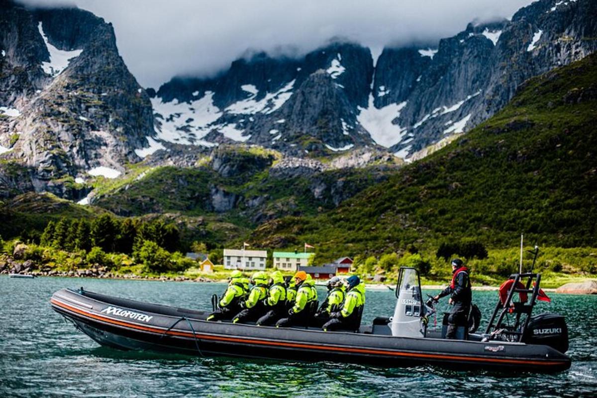 a group of people in a boat in the water