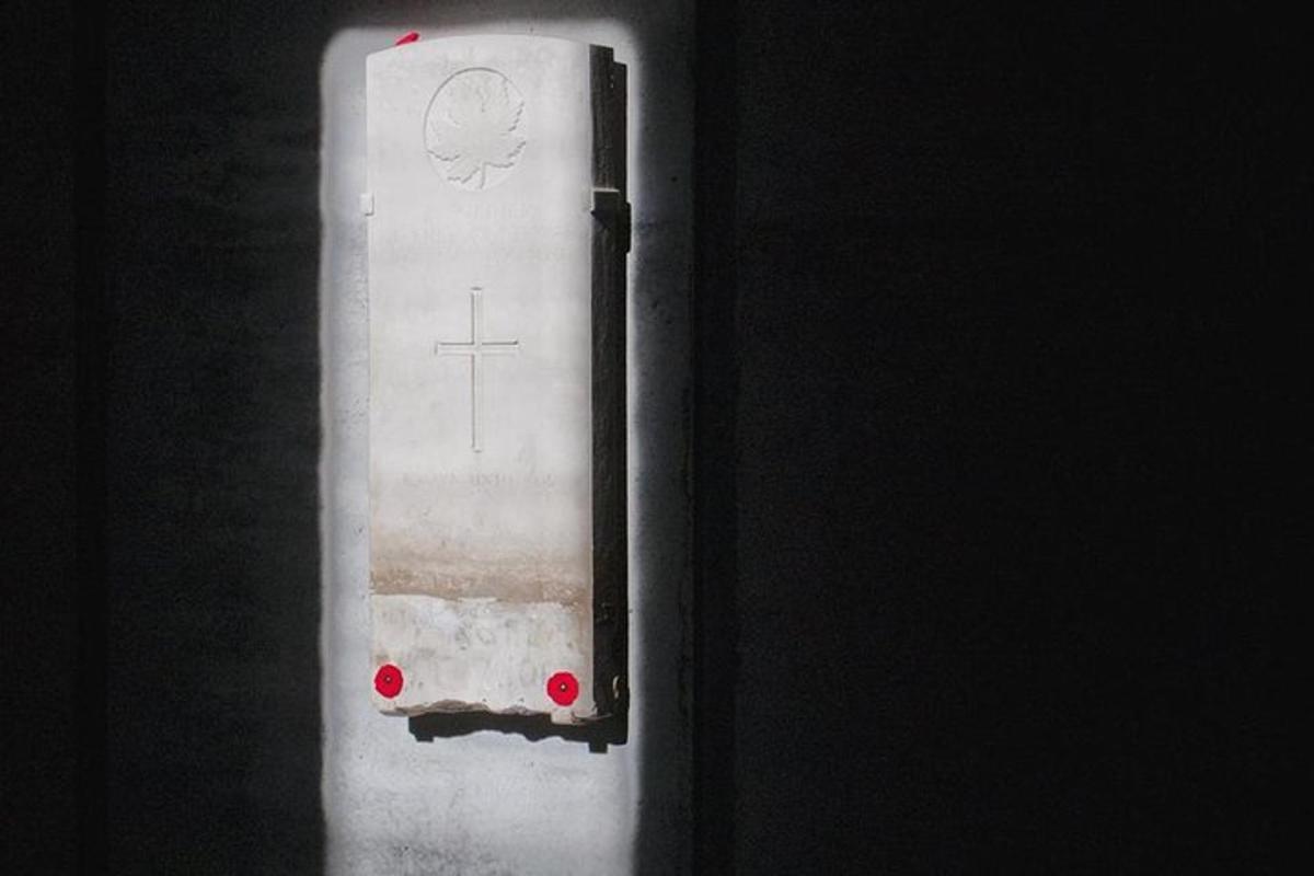 a white snowboard with a cross painted on it
