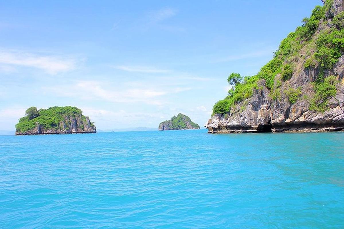 two islands in the ocean with blue water