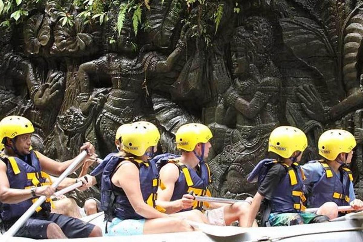 a group of people rafting on a river