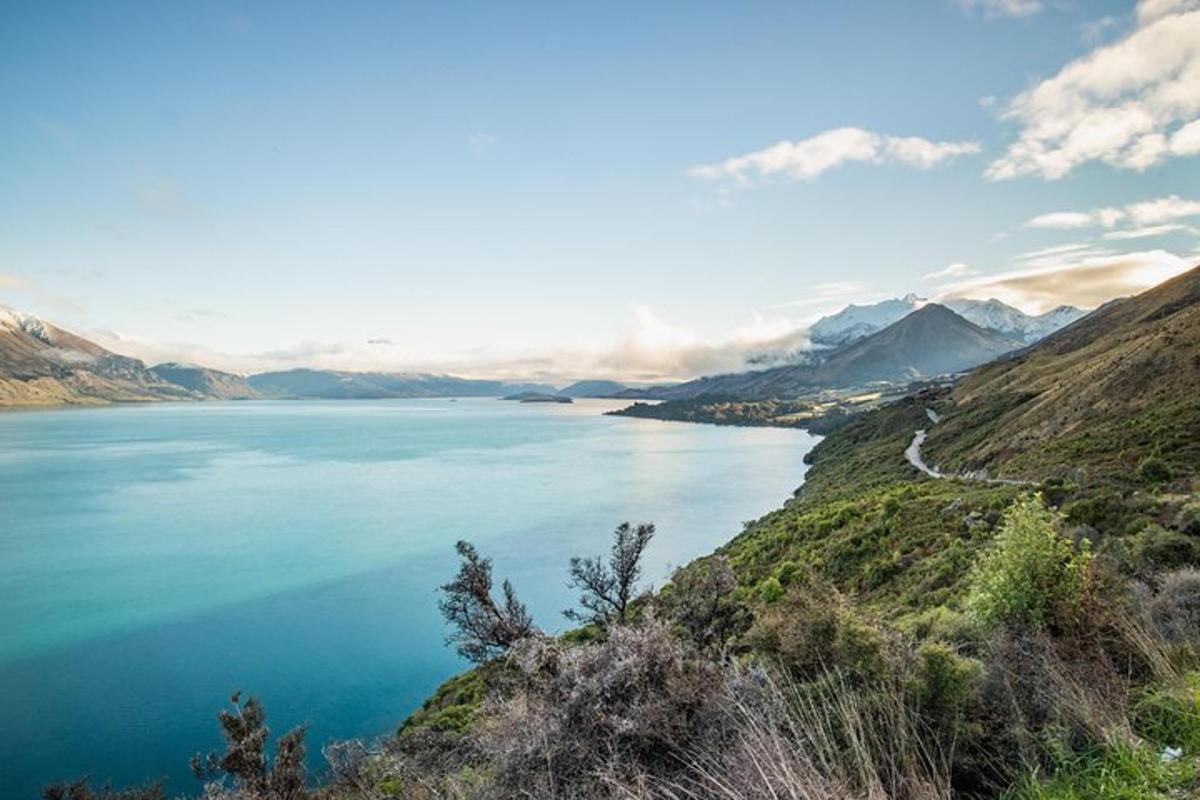 a view of a large body of water with mountains