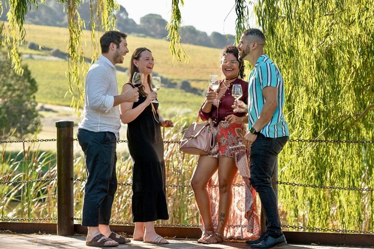 a group of people standing next to a fence