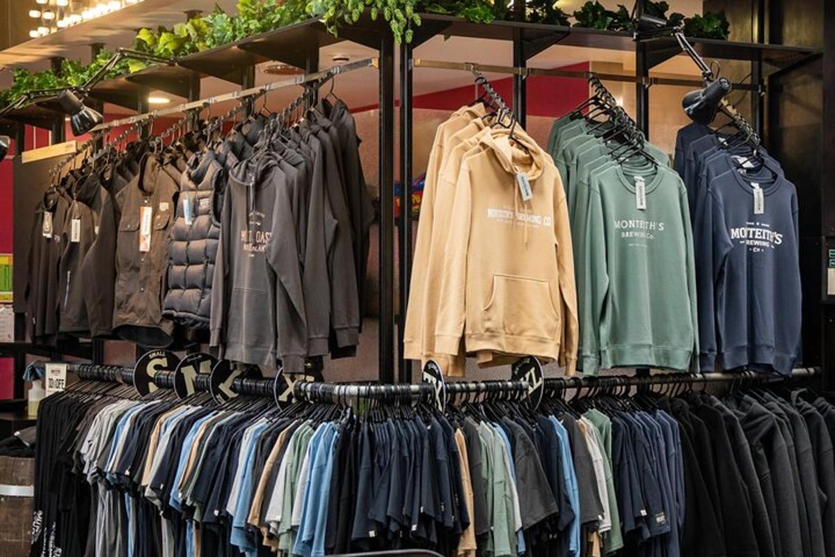 a rack of clothes on display in a store