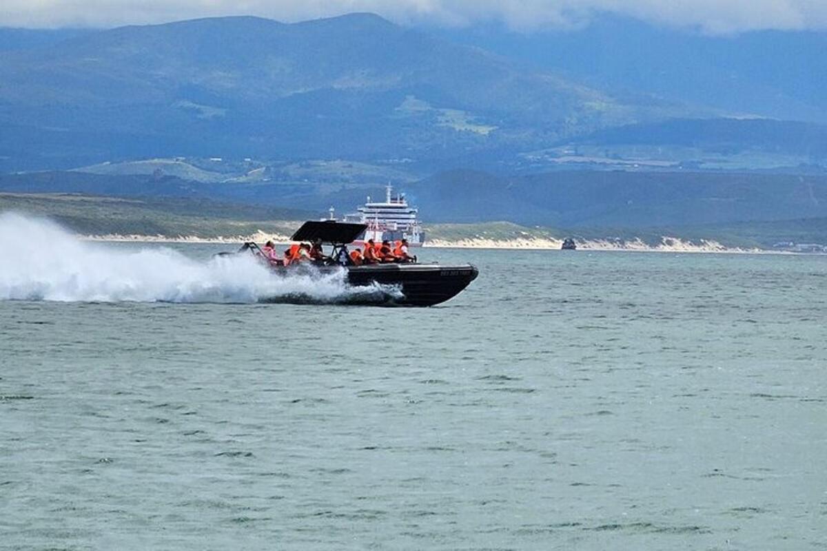 a boat traveling on the water in the ocean