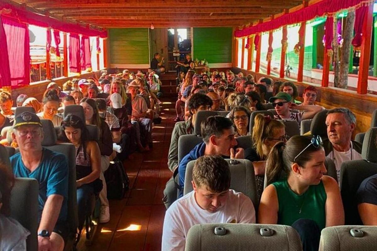 a group of people sitting on a bus