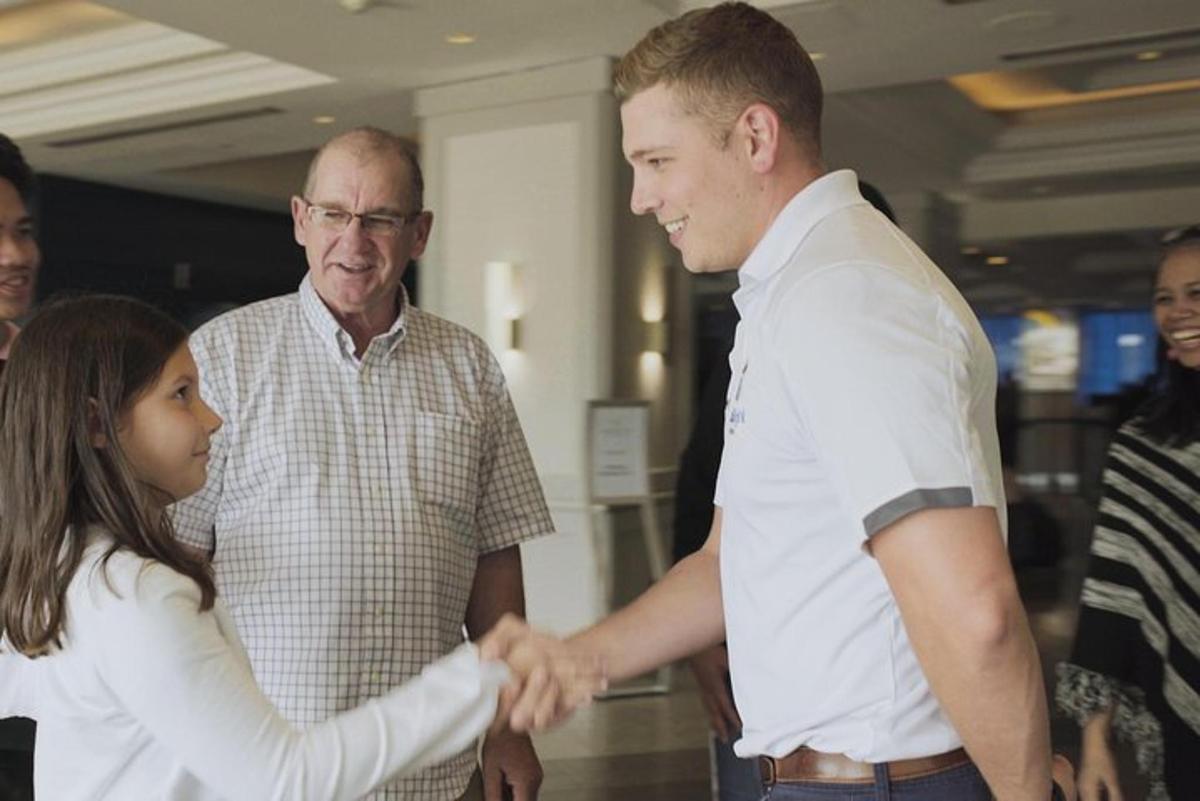 a man and a woman shaking hands