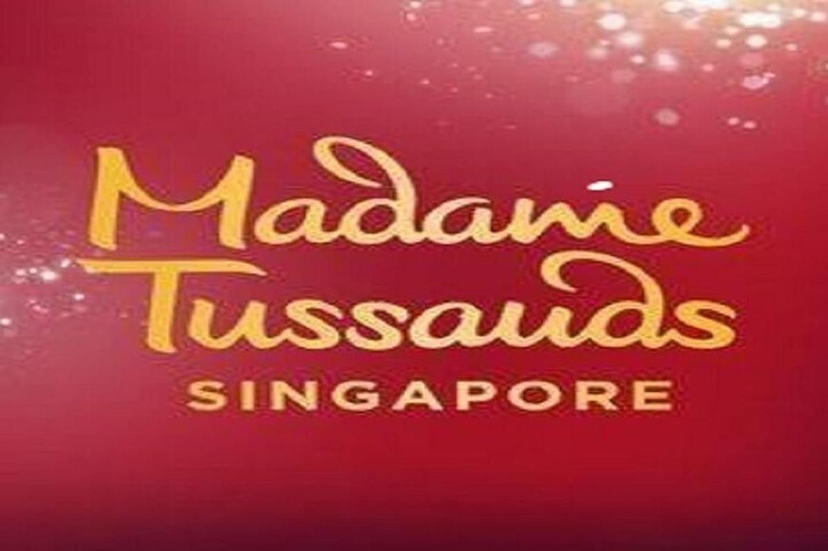 uma placa que diz malamute tinsani Singapura