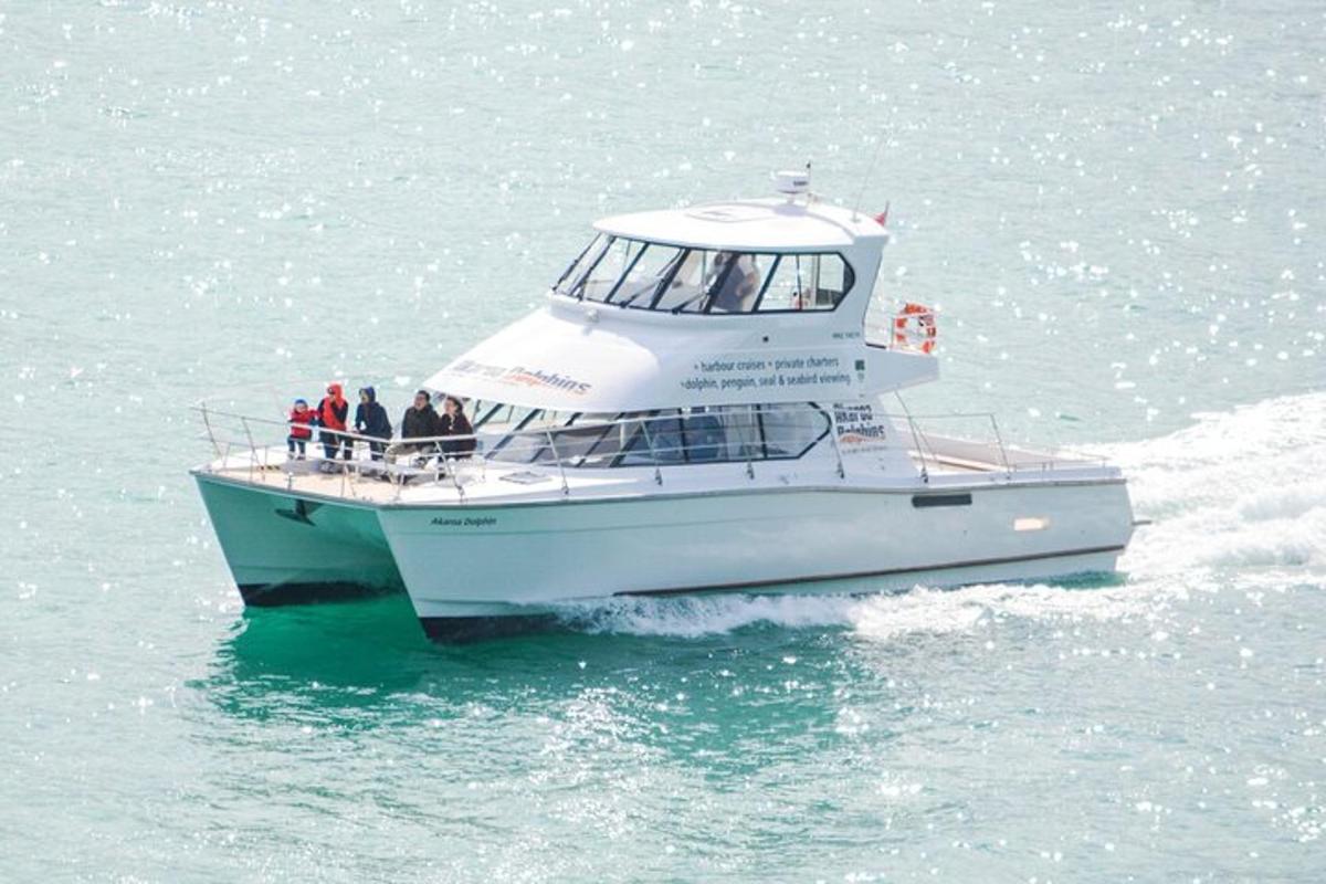 a group of people on a boat in the water