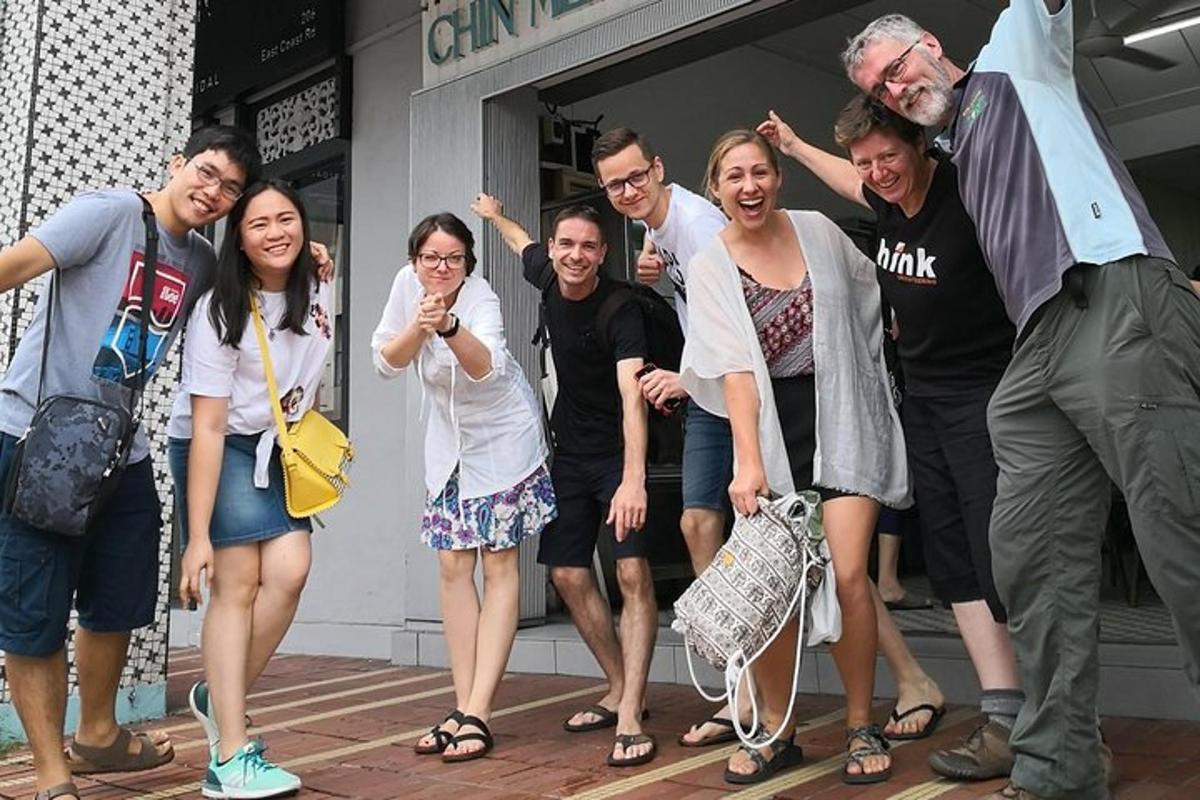 a group of people standing outside of a building