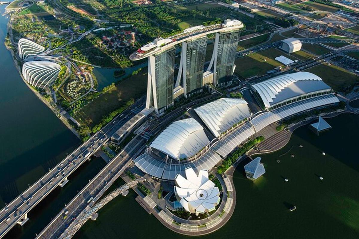 an overhead view of a building with a river