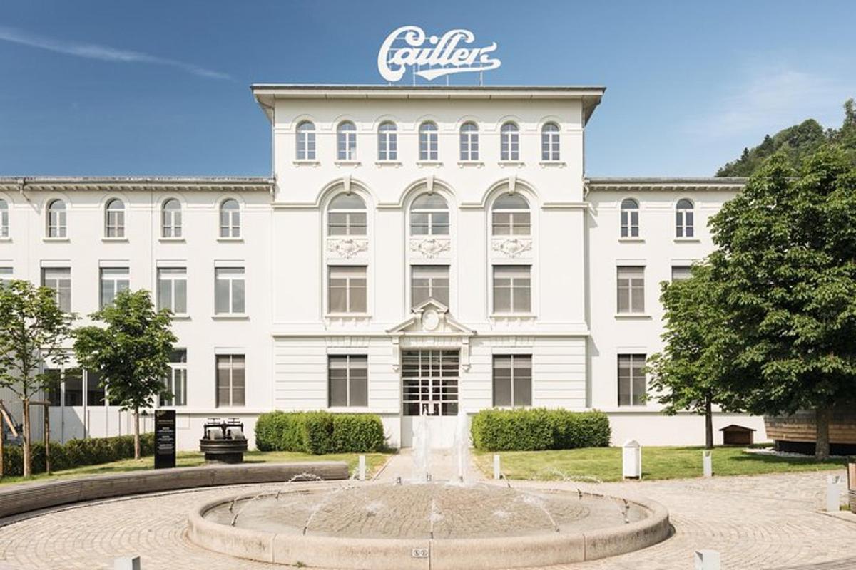 a large white building with a fountain in front of it