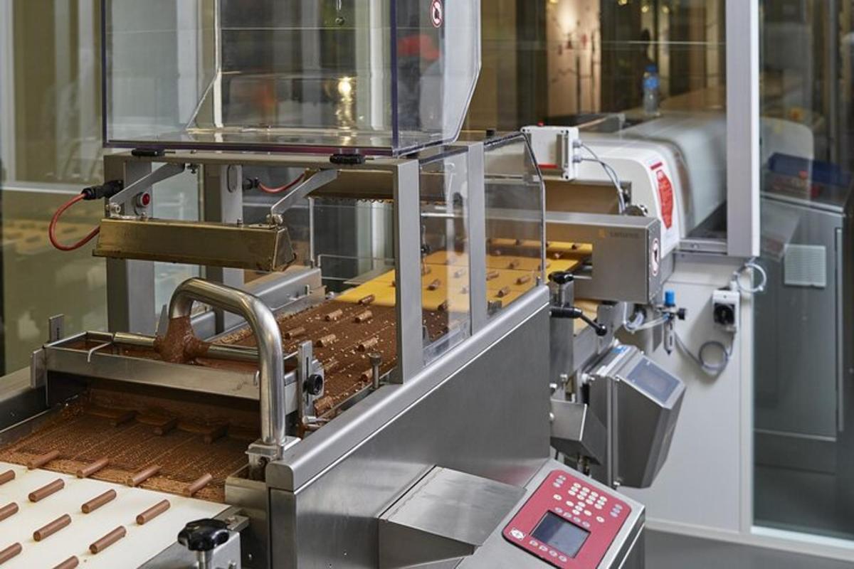 a machine that is making wood on a table
