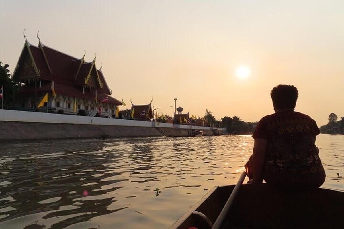 a person is rowing a boat on the water