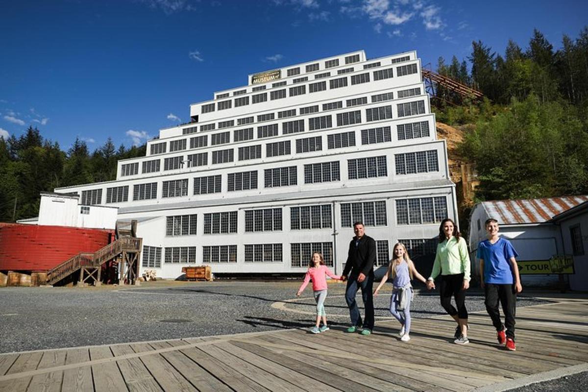a group of people walking in front of a building