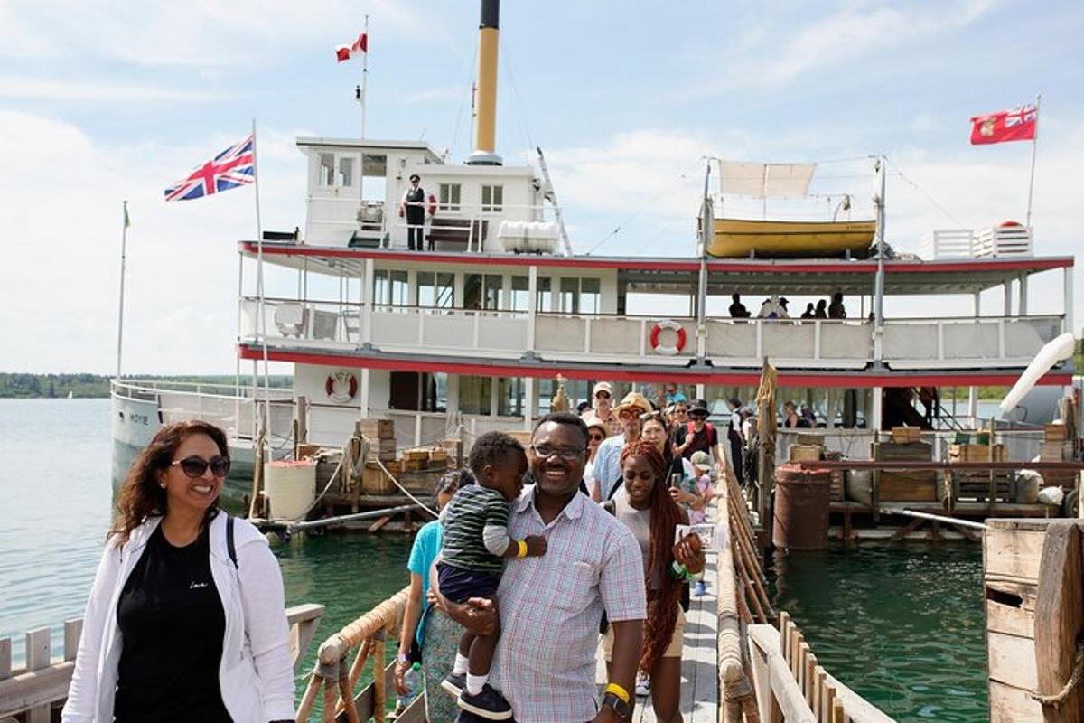a group of people on a boat in the water