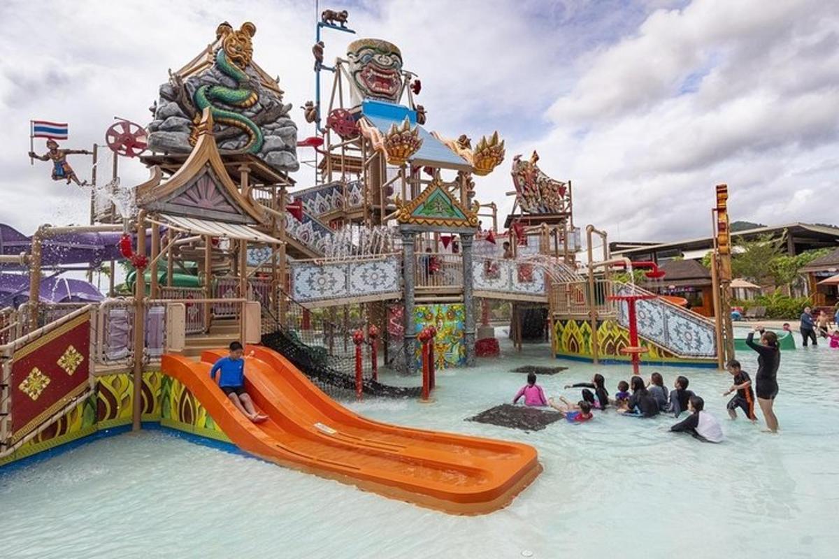 a group of people playing in a water park