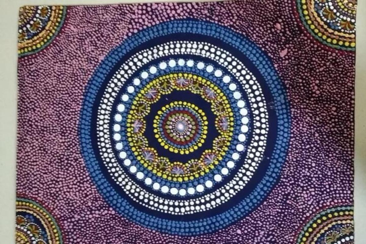 a close up of a rug with a design on it