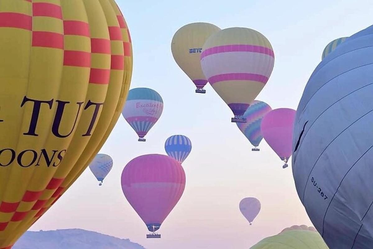 a bunch of hot air balloons in the sky