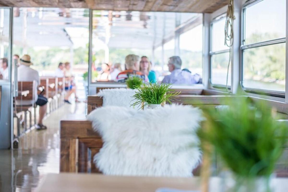 a restaurant with people sitting at tables in a building