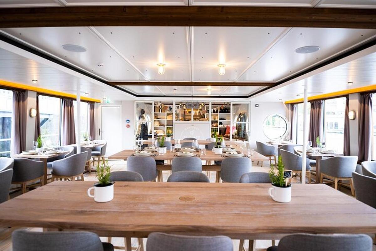 a dining room with wooden tables and chairs