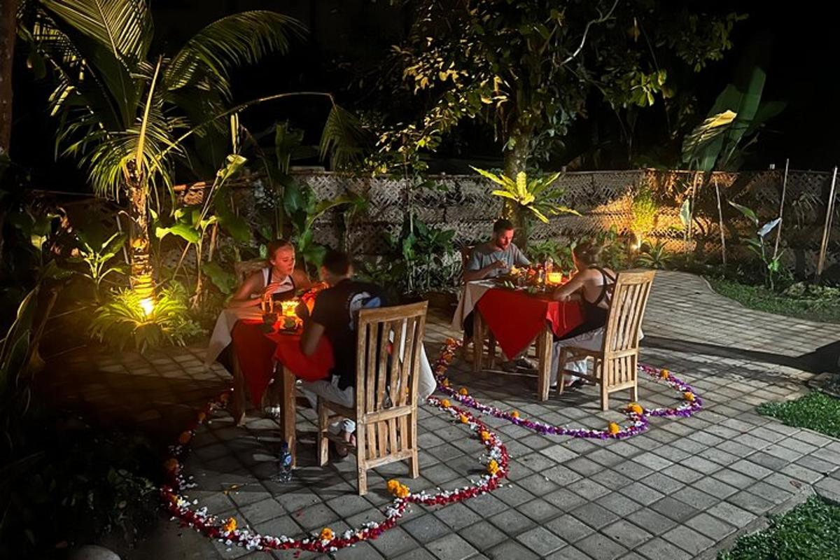 a group of people sitting at a table at night