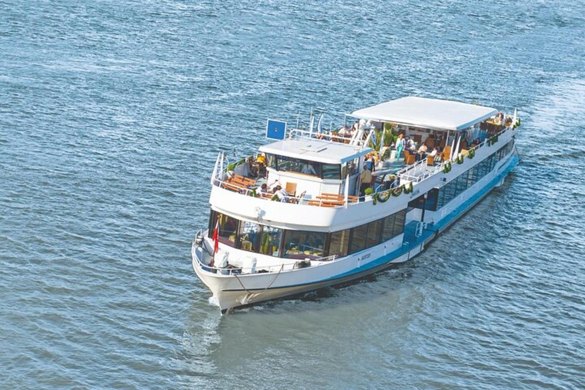 a boat with people on it in the water