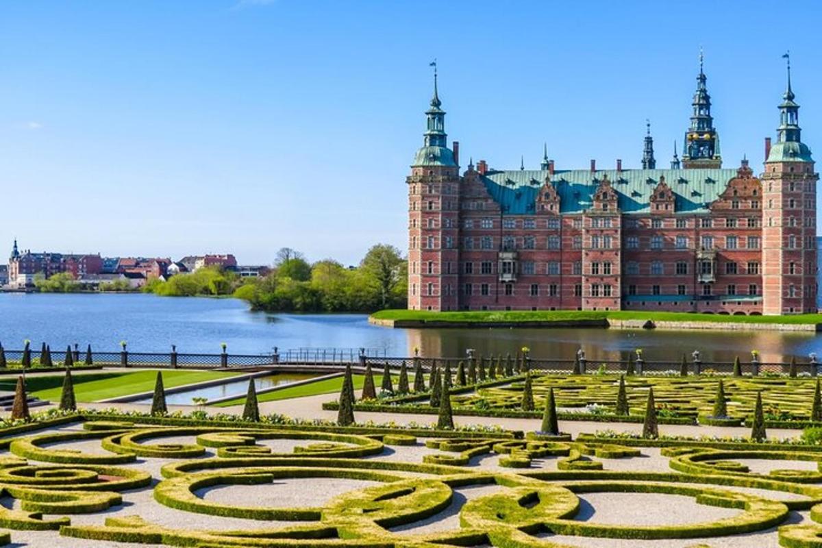 a large building with a maze in front of it