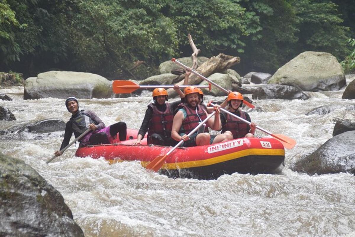 a group of people in a raft in a river