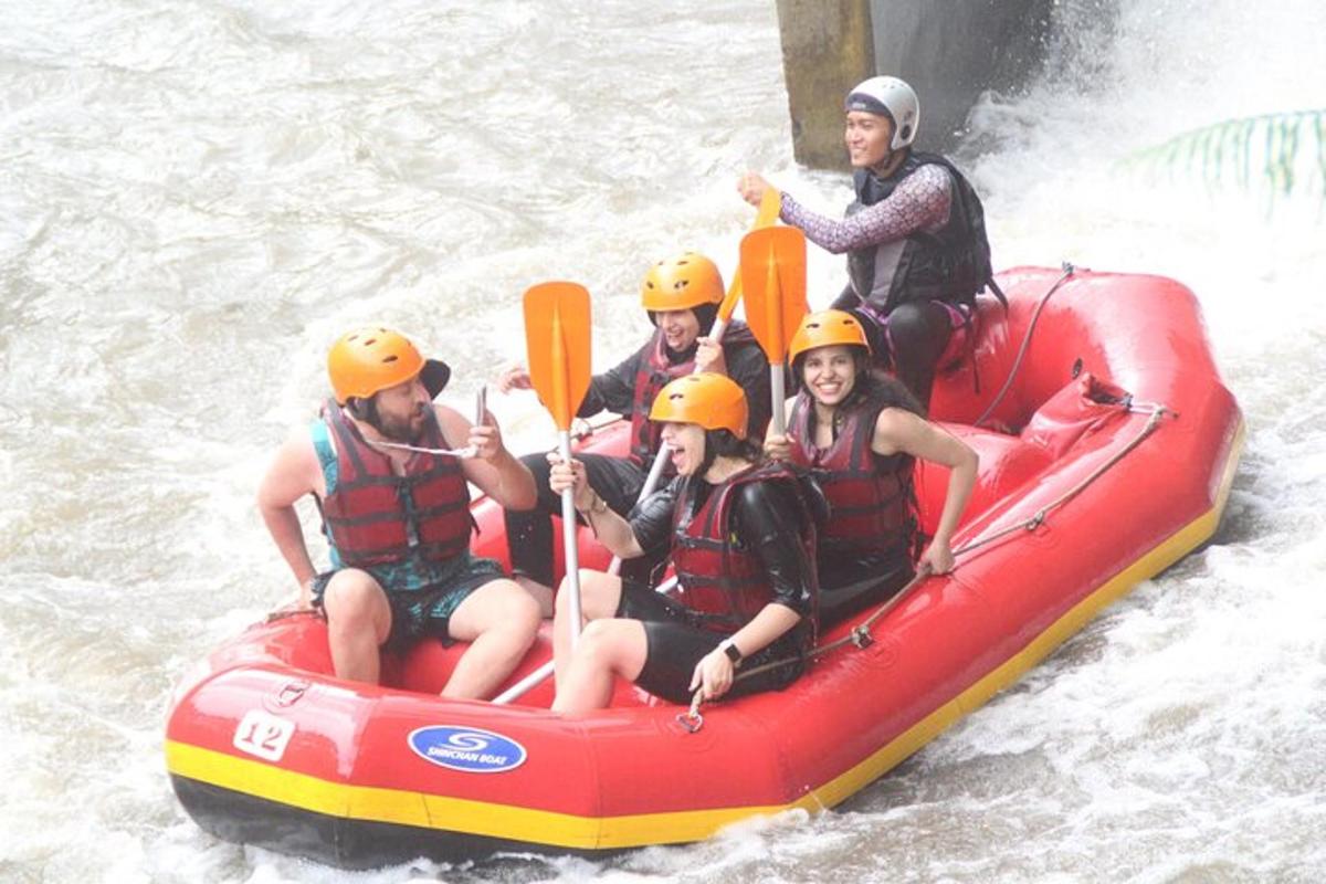 a group of people on a raft in the water