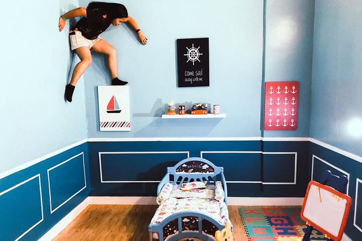 a childs room with a boy jumping in the air