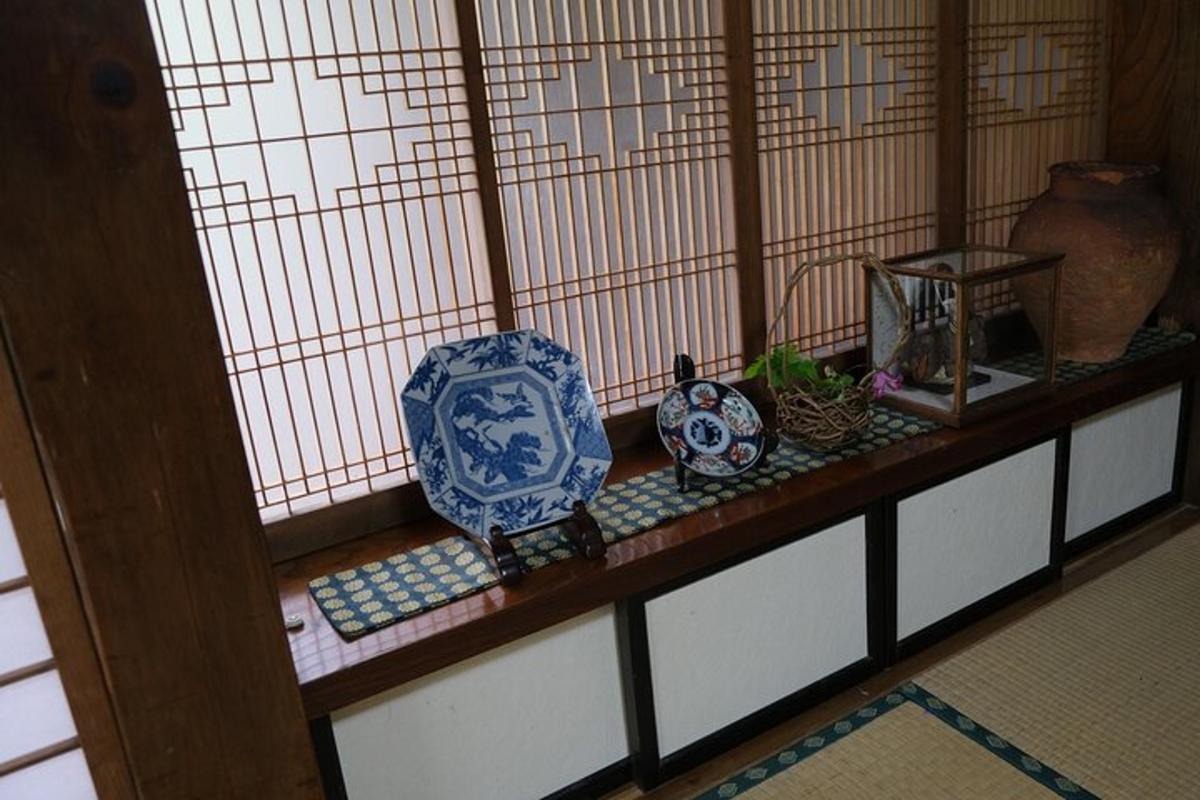 a shelf with vases and other items on it