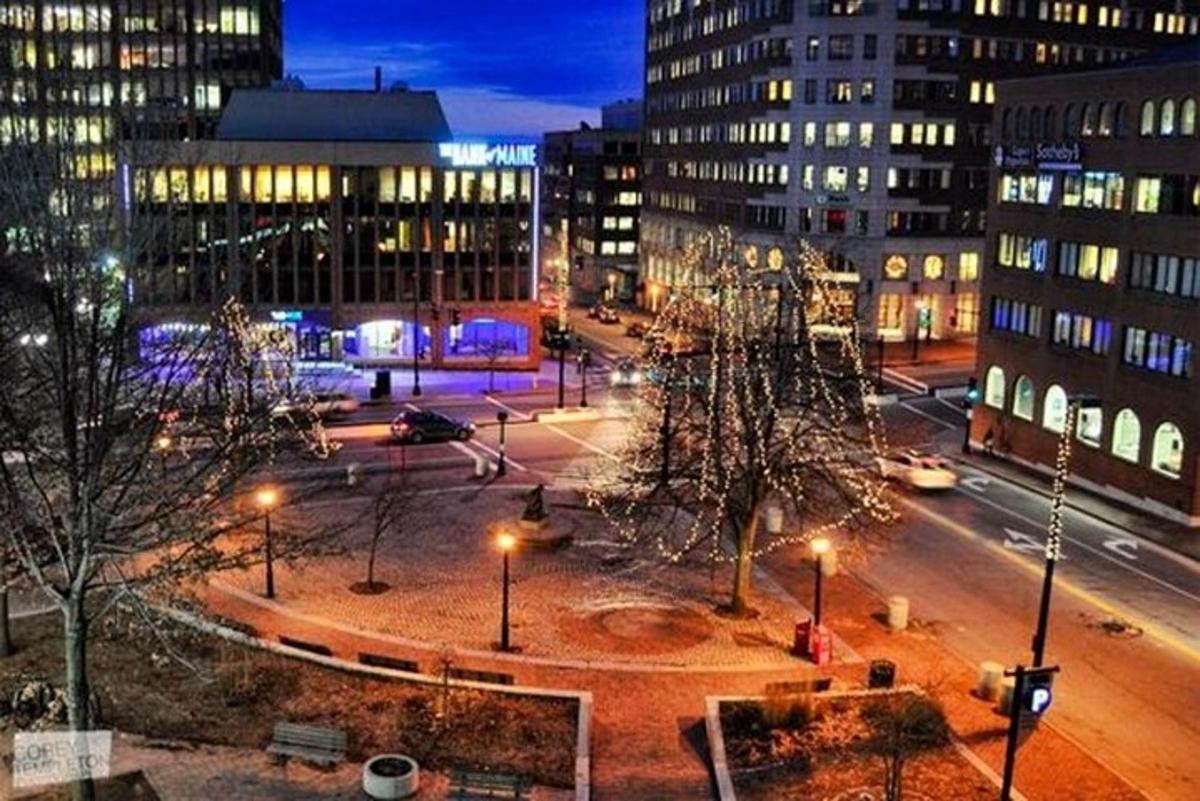 a view of a city at night with street lights